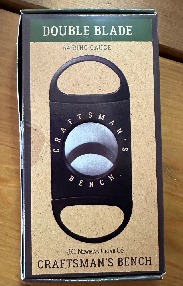 With its custom dual blade construction, the Craftsman’s Bench Double Blade Cigar Cutter is designed for equal pressure to be applied to both sides of the cigar. The result is the cleanest cut possible to provide a smoother, more even flow of smoke. Extremely affordable and practical, this cutter is designed to accommodate cigars up to 64-ring gauge.