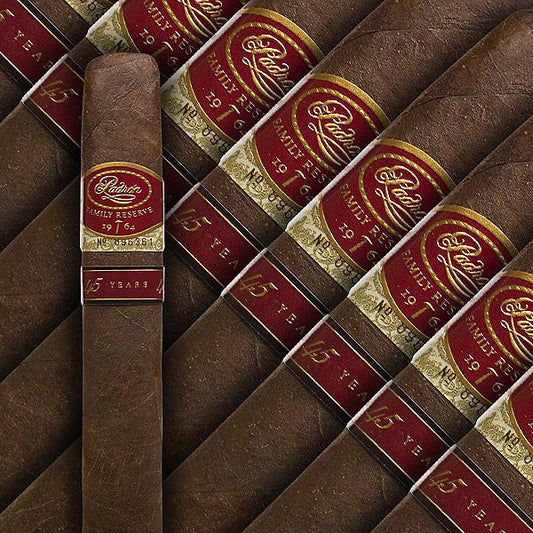 
The Padron Family Reserve #45 is a limited production cigar from Padron. Available in a Maduro wrapper, this cigar is made with tobacco aged for 10 years. Box-pressed, full bodied, and 52 x 6" in size. Rated 95 and voted "2009 Cigar of the Year" by Cigar Aficionado. 
